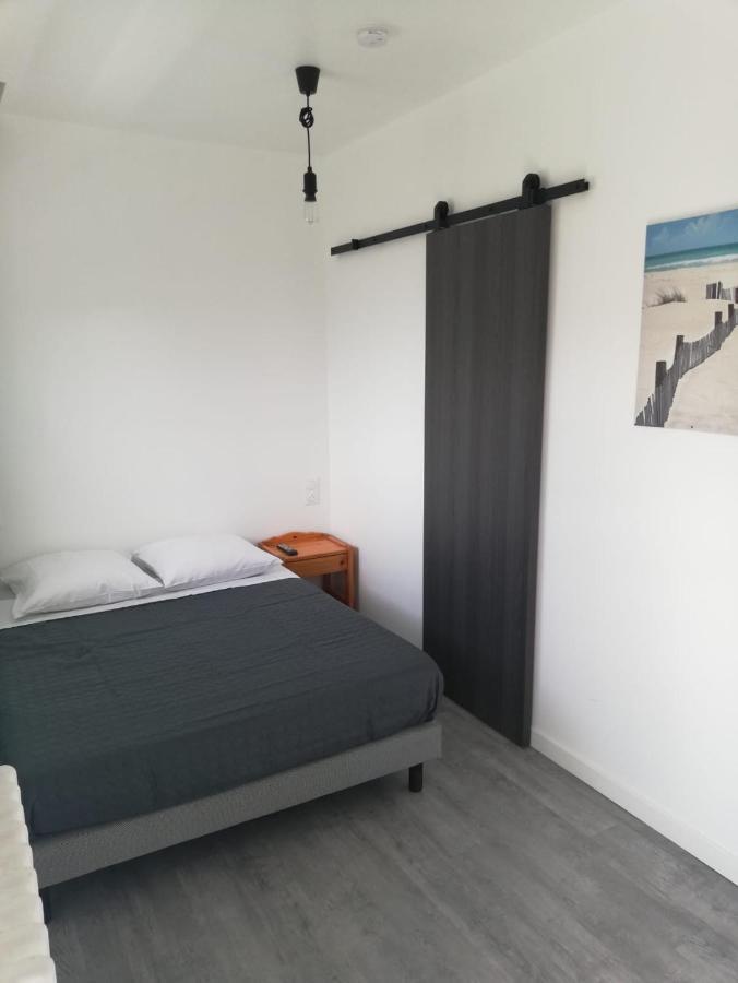 Le Breton Hotel Basse-Indre Екстериор снимка